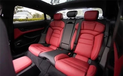Porsche Taycan modificēts melns un sarkans ādas salons
